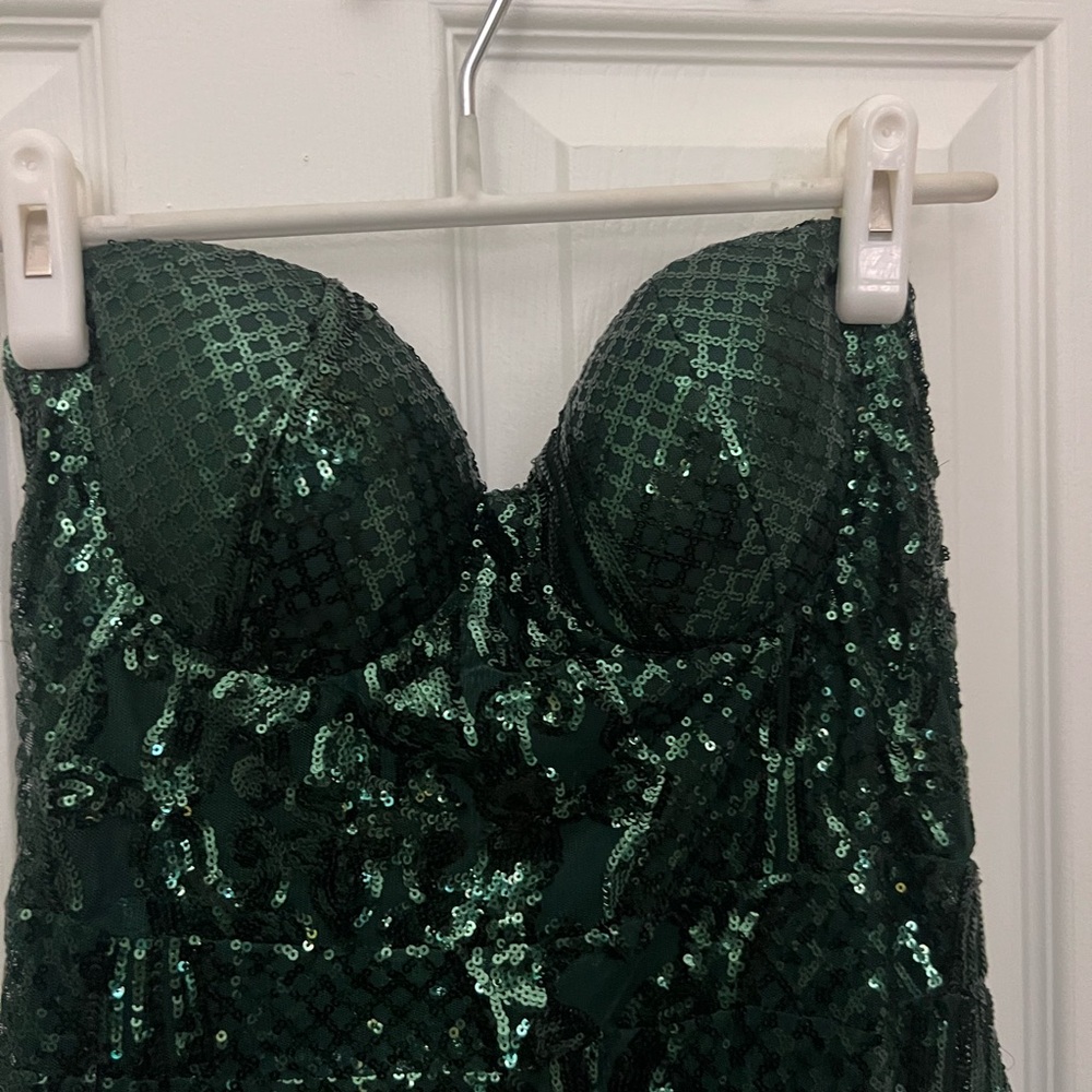 Full length emerald green sequin evening dress